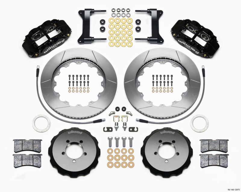 Wilwood 140-12875 Forged Narrow Superlite 6R Big Front Brake Kit featuring black calipers, silver rotors, brake pads, and various mounting hardware arranged neatly.