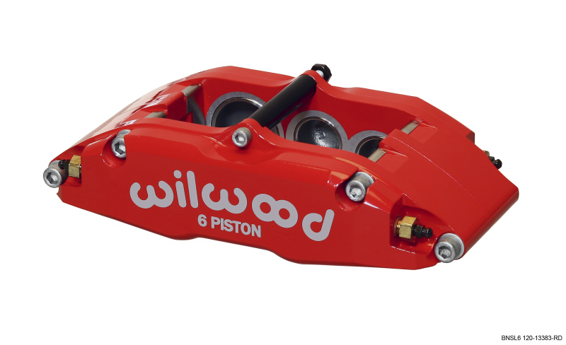 Red billet aluminum caliper featuring six pistons, marked with "wilwood" in white, designed for rear mount with six lug compatibility, showcasing precision engineering and robust construction.