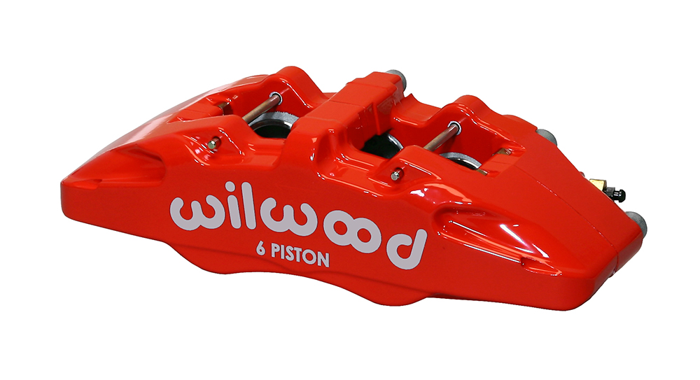 Red forged aluminum caliper with "wilwood" branding, featuring six pistons, designed for right-hand use, with a 5.25-inch mount and compatibility for 0.81-inch discs.