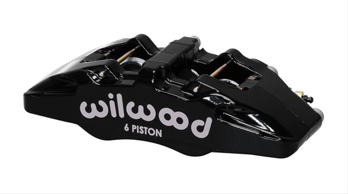 Black forged aluminum caliper featuring six pistons, marked with "wilwood" in white, designed for 5.25-inch mounting with specifications for disc compatibility.