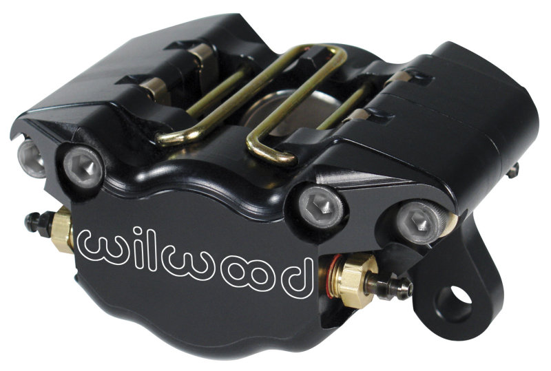 Black anodized aluminum brake caliper with gold mounting hardware, featuring dual pistons and a distinctive Wilwood logo, designed for 0.38 in. disc compatibility.