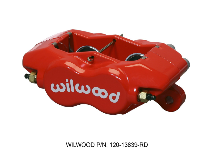 Bright red brake caliper with a glossy finish, featuring the white "Wilwood" logo and brass fittings, designed for high-performance braking systems.