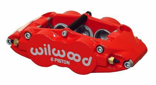Red forged aluminum brake caliper featuring a six-piston design, with "wilwood" logo prominently displayed in white on the side.
