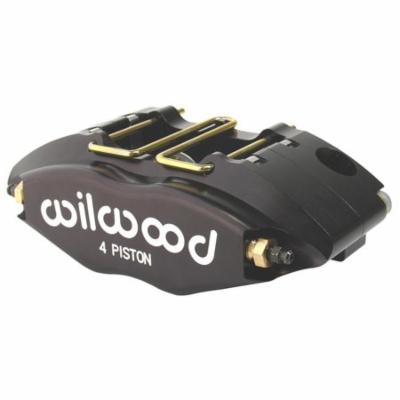 Black Wilwood Powerlite radial mount caliper featuring a sleek design, 4-piston configuration, and gold hardware, with the "Wilwood" logo prominently displayed.