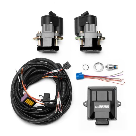Black electronic parking brake rear retrofit brake kit by Wilwood, featuring two motors, wiring harness, and control module, designed for enhanced braking performance.