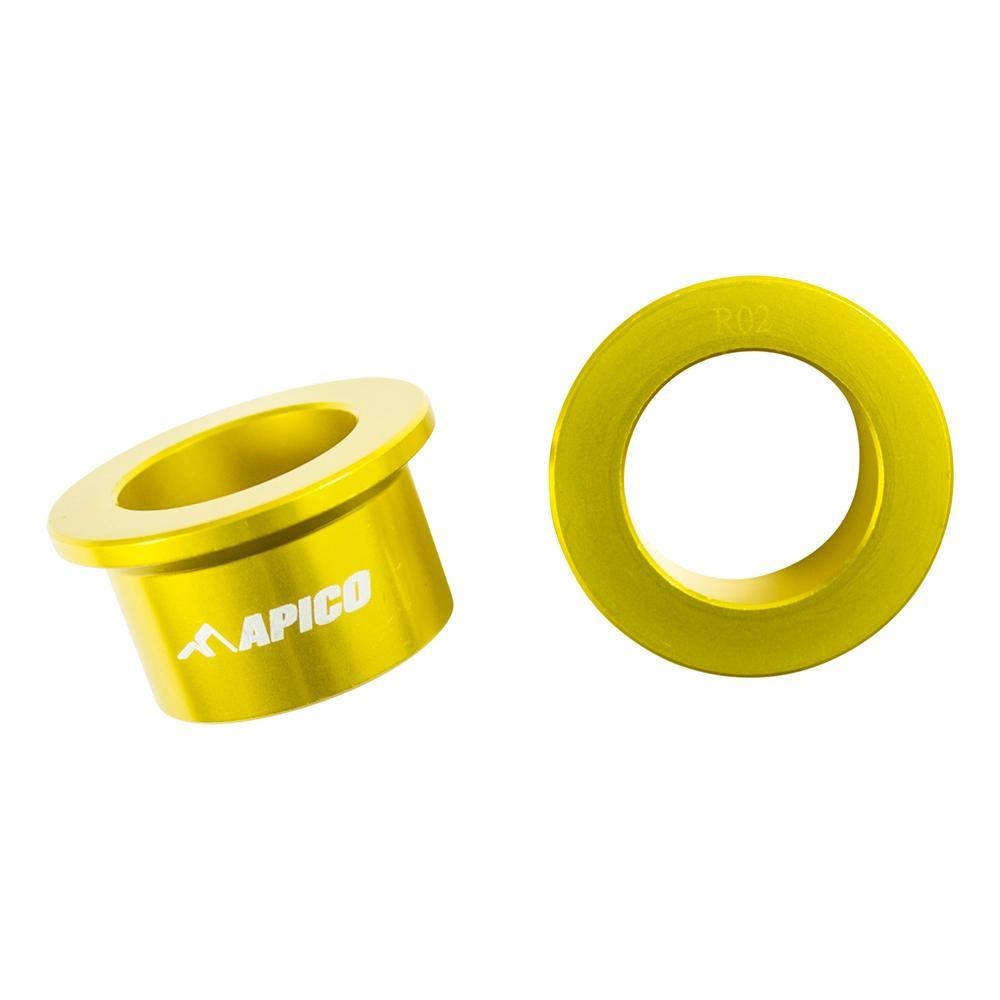Gold aluminum rear wheel spacers by Apico for Suzuki RMZ 250/450 (2007-2022), featuring a smooth finish and engraved logo for enhanced durability and performance.