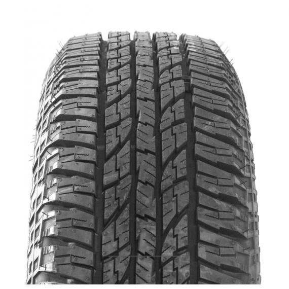 Yokohama GEOLANDAR a/T (G015) all-season tire features a rugged tread pattern, deep grooves for traction, and a black rubber finish, sized 245/75 R16.