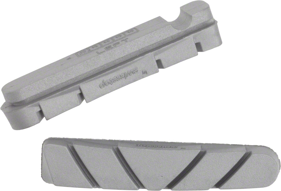 Zipp Tangente Platinum Pro Evo brake pad inserts in silver, featuring a sleek design with grooves for improved braking performance and marked "LEFT" on one insert.