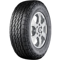 Bridgestone Dueler A/T002 tire, rugged tread pattern, 205/80 R16 size, black with raised white lettering on the sidewall.