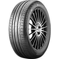 Bridgestone Turanza T001 tire, 195/65 R15 91H, with sleek black tread and radial grooves on a silver alloy wheel.