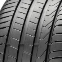 Pirelli Cinturato P7 tire with black rubber, asymmetric tread pattern, and wide grooves for enhanced grip.