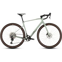 Cube Nuroad C:62 One gravel bike, light green frame, drop handlebars, brown tires, disc brakes, and black saddle.