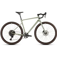 Light green Cube Nuroad Pro gravel bike with drop handlebars, disc brakes, and brown tires.