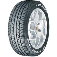 Dunlop SP Sport 7000 tire, 225/55 R18 98V, black tread with white sidewall lettering, mounted on a silver alloy wheel.