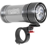 Gray Exposure Toro Mk16 bike light, cylindrical with ribbed design, three LED lenses, and black handlebar mount.