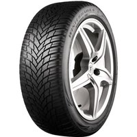 Firestone Winterhawk 4 tire, 225/60 R18, black with V-shaped tread pattern, mounted on a silver alloy wheel.