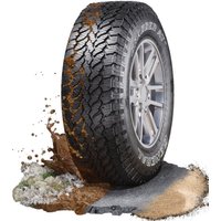 All-terrain General GRABBER AT3 tire, 205/70 R15, with kerbing rib, rugged tread pattern, and white lettering.