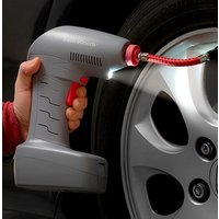 Gray InnovaGoods Airpro+ Tyre Compressor with red nozzle and LED light, inflating a car tire.