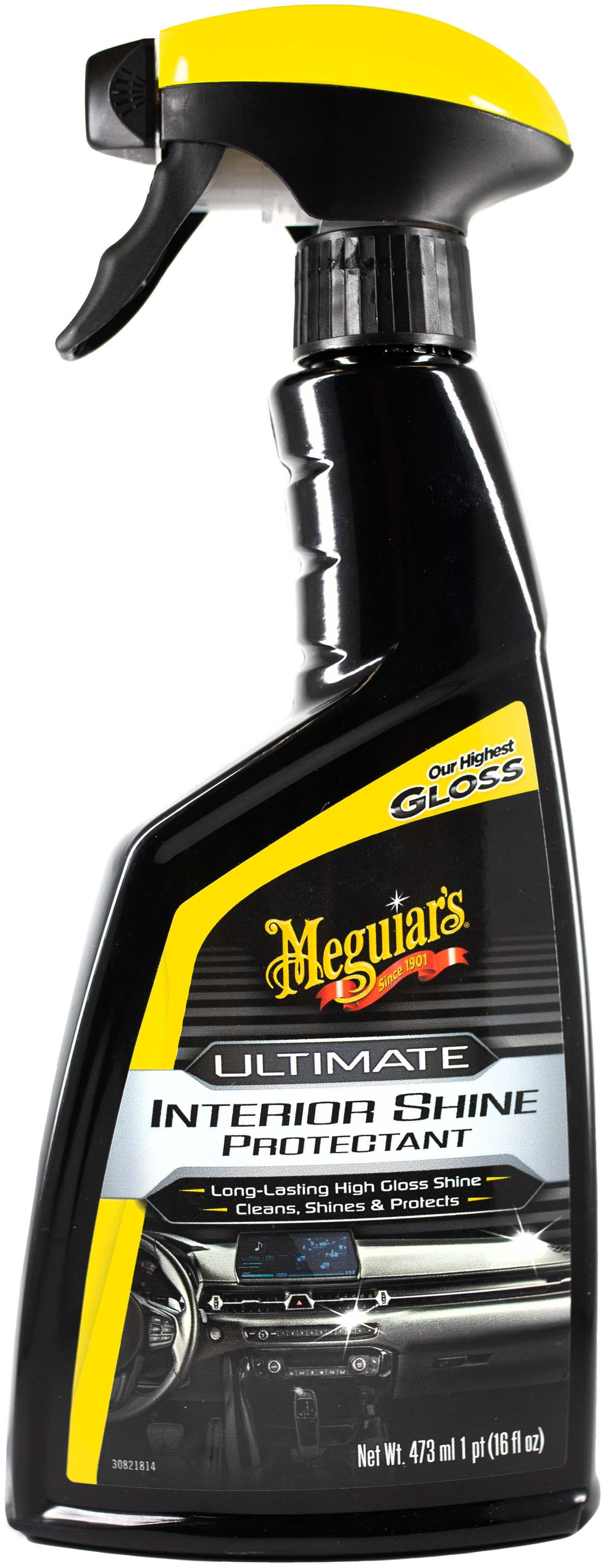 Black spray bottle of Meguiar's Ultimate Interior Shine Protectant with yellow label and trigger nozzle.