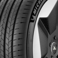 Black Michelin Primacy 5 Energy tire with detailed tread pattern and visible sidewall branding.