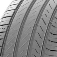 Black MICHELIN Primacy 5 tire with asymmetrical tread pattern and wide grooves for enhanced grip and performance.