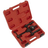 Red Sealey 3 Jaw Wheel Bearing Puller in a red plastic case with black clasps and molded interior compartments.