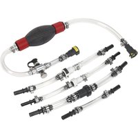 Diesel engine priming kit with clear hoses, red and black bulb, and various connectors for Ford vehicles.