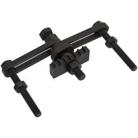 Black Sealey flywheel locking tool with adjustable arms and threaded bolts for Hyundai and Kia vehicles.