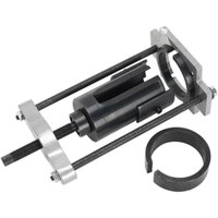 Sealey trailing arm bush tool with silver metal frame, black central component, and circular attachment for Volvo and Ford.