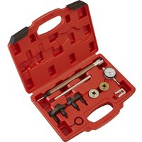 Red Sealey timing tool kit with various metal tools and a gauge in a molded case.