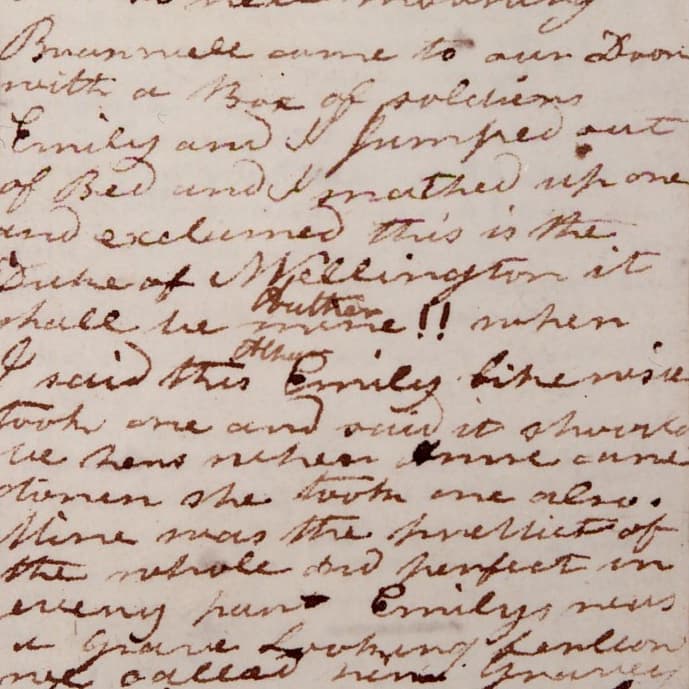 Close-up of handwritten historical letter with cursive script