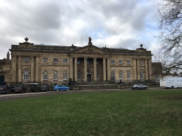 Neoclassical building with columns and symmetrical facade