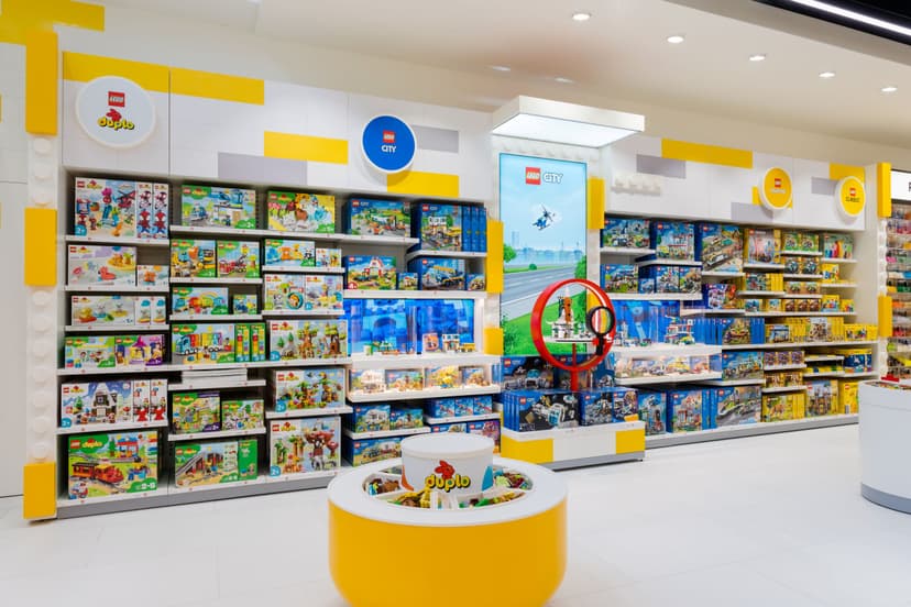 Brightly lit toy store with colorful building sets on shelves