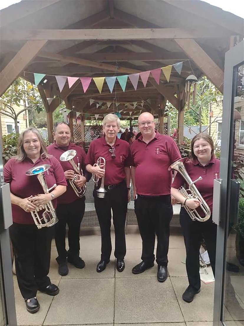 Featured image for Brass Band Performance at Holmfirth Care Home Creates Memories - Arts & Culture