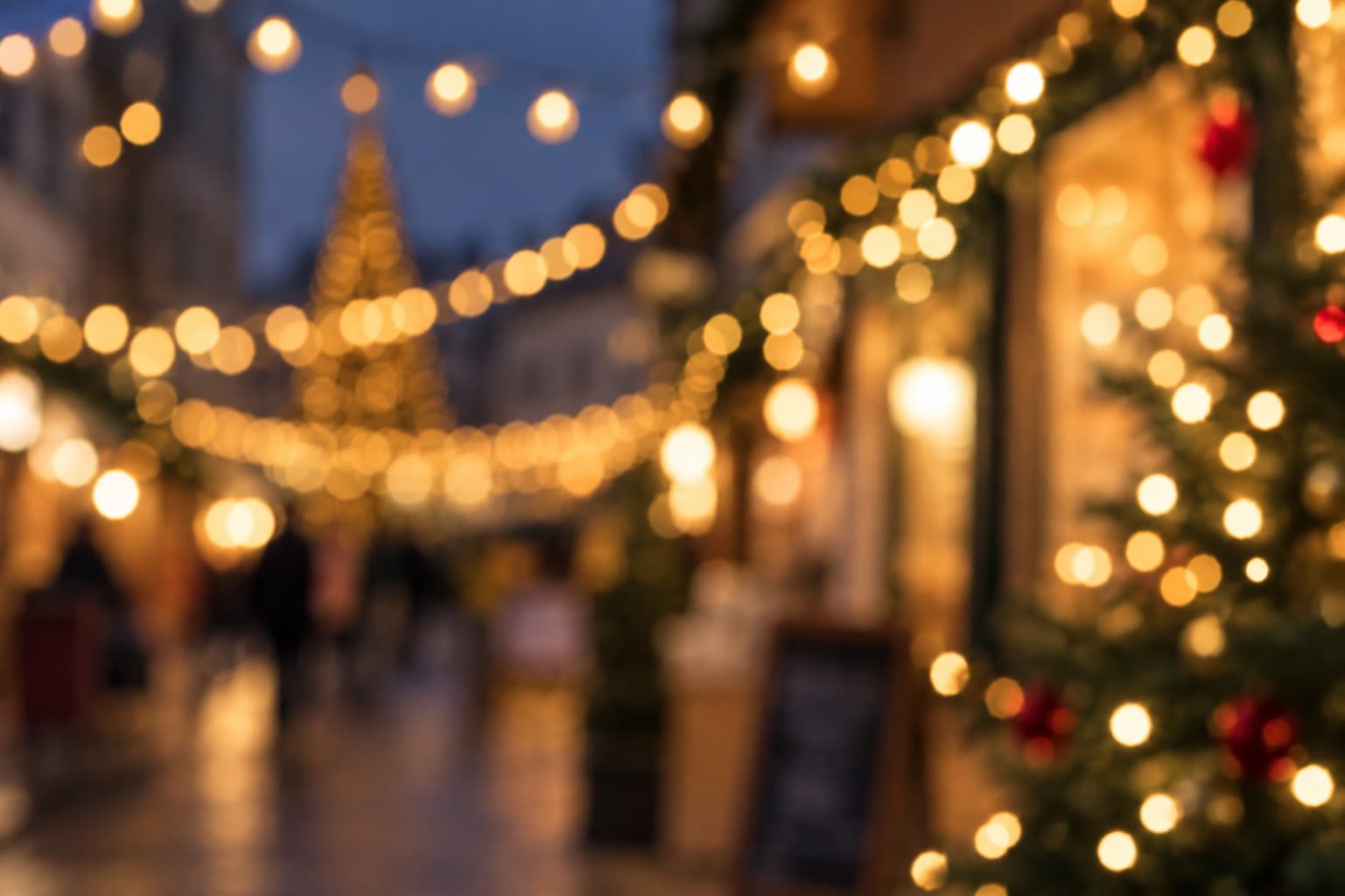 Festive street with Christmas lights and decorated trees