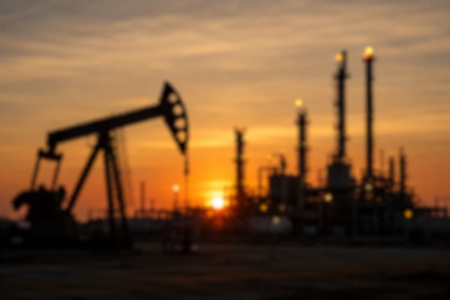 Silhouette of an oil rig and refinery at sunset in Yorkshire