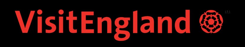 VisitEngland logo in bold red lettering with emblem