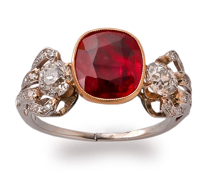 Vintage ruby ring with intricate diamond details
