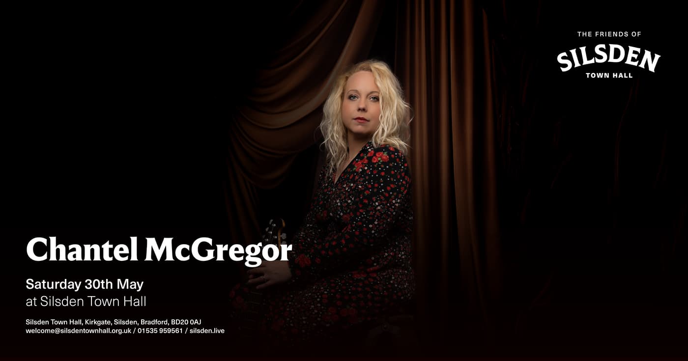 Chantel McGregor sits elegantly against a rich, dark curtain backdrop, promoting her concert at Silsden Town Hall.