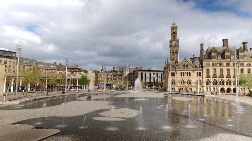 Bradford City Park with fountains and historic buildings