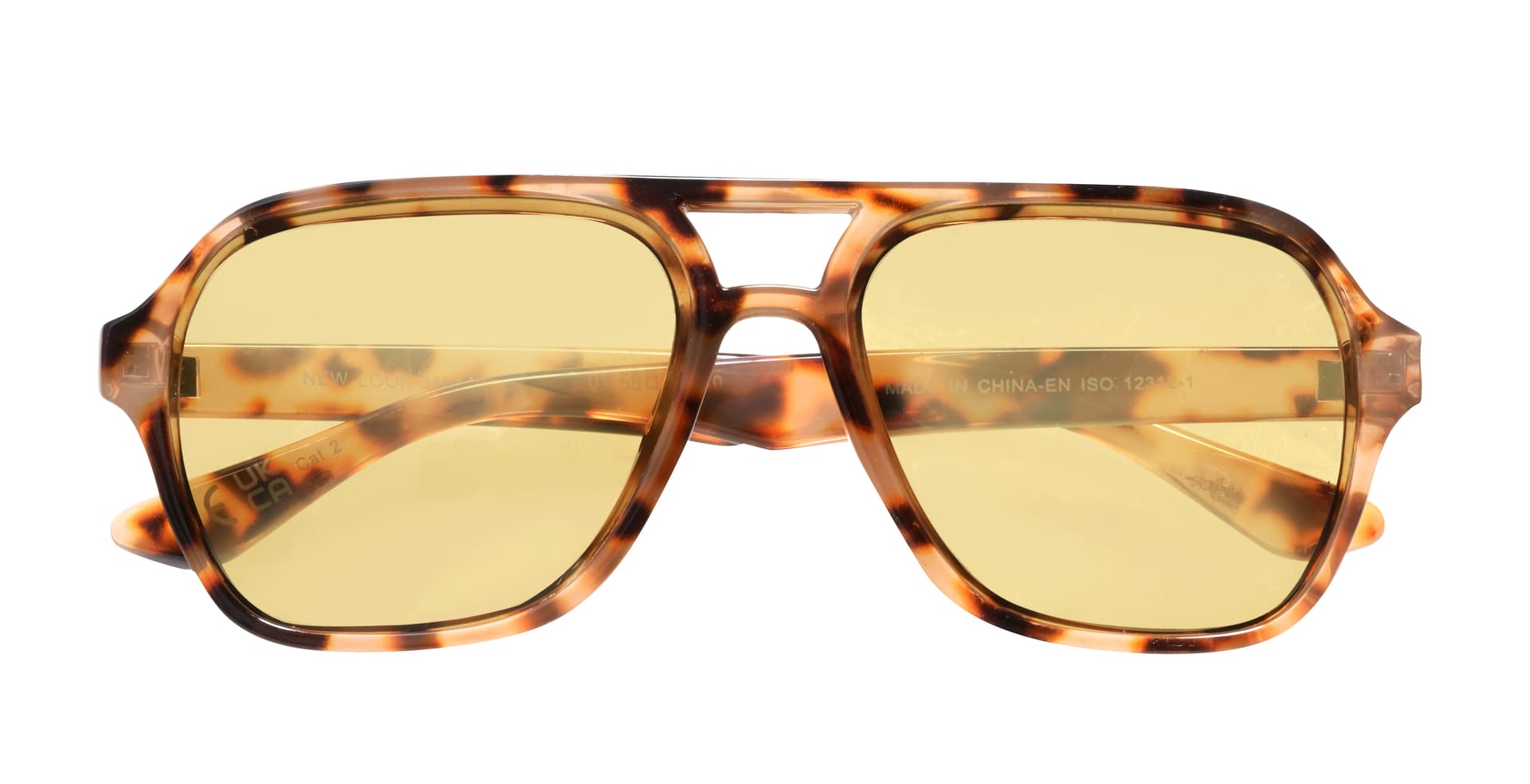 Tortoiseshell sunglasses with yellow lenses on white background