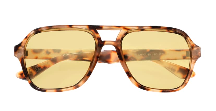 Tortoiseshell sunglasses with yellow lenses on white background