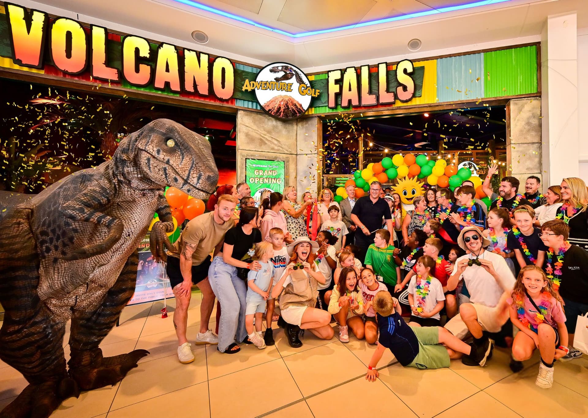Group of people celebrating at indoor adventure golf centre