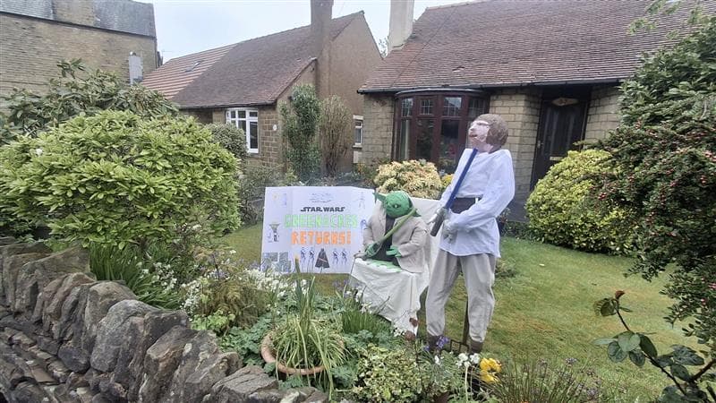 Garden with Star Wars character scarecrows in Yorkshire village