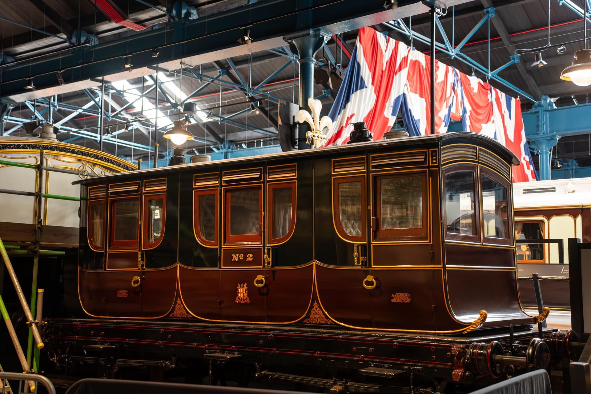 Victorian railway carriage with ornate detailing in museum