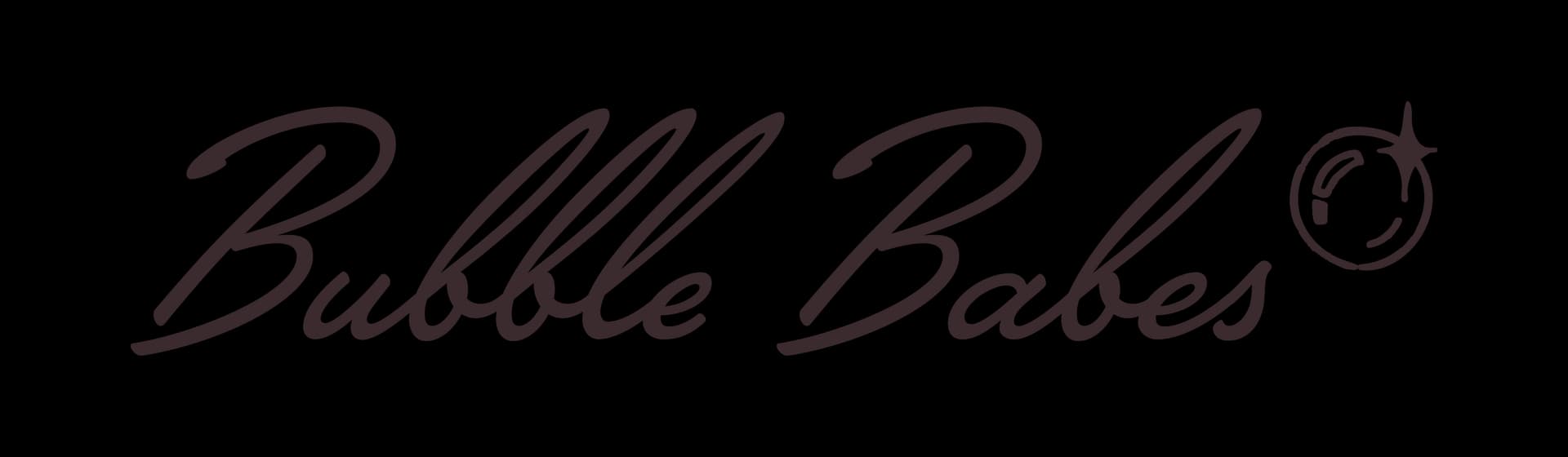 "Bubble Babes Launderette sign with playful, cursive lettering on a dark background."