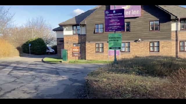 Car park entrance near a Premier Inn, with signage for customer parking and a tree-lined area in Thornaby, Yorkshire.