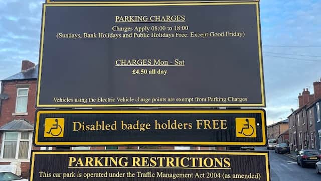 Sign for Turton Street Car Park in Wakefield, detailing parking charges, restrictions, and free access for disabled badge holders.