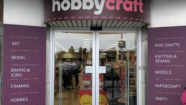 Entrance of Hobbycraft in York with signage highlighting various craft categories like art, baking, and knitting.