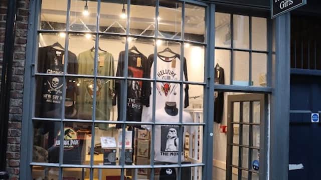 Shopfront of Take One Gifts in York, featuring various gift items displayed in a large window.